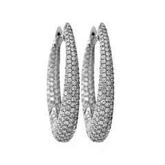 Boucles d'oreilles ovales en or blanc 18 carats et diamants