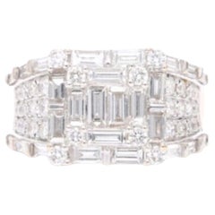 Ring aus Weißgold und Diamanten im runden Brillantschliff - Baguette-Diamanten app