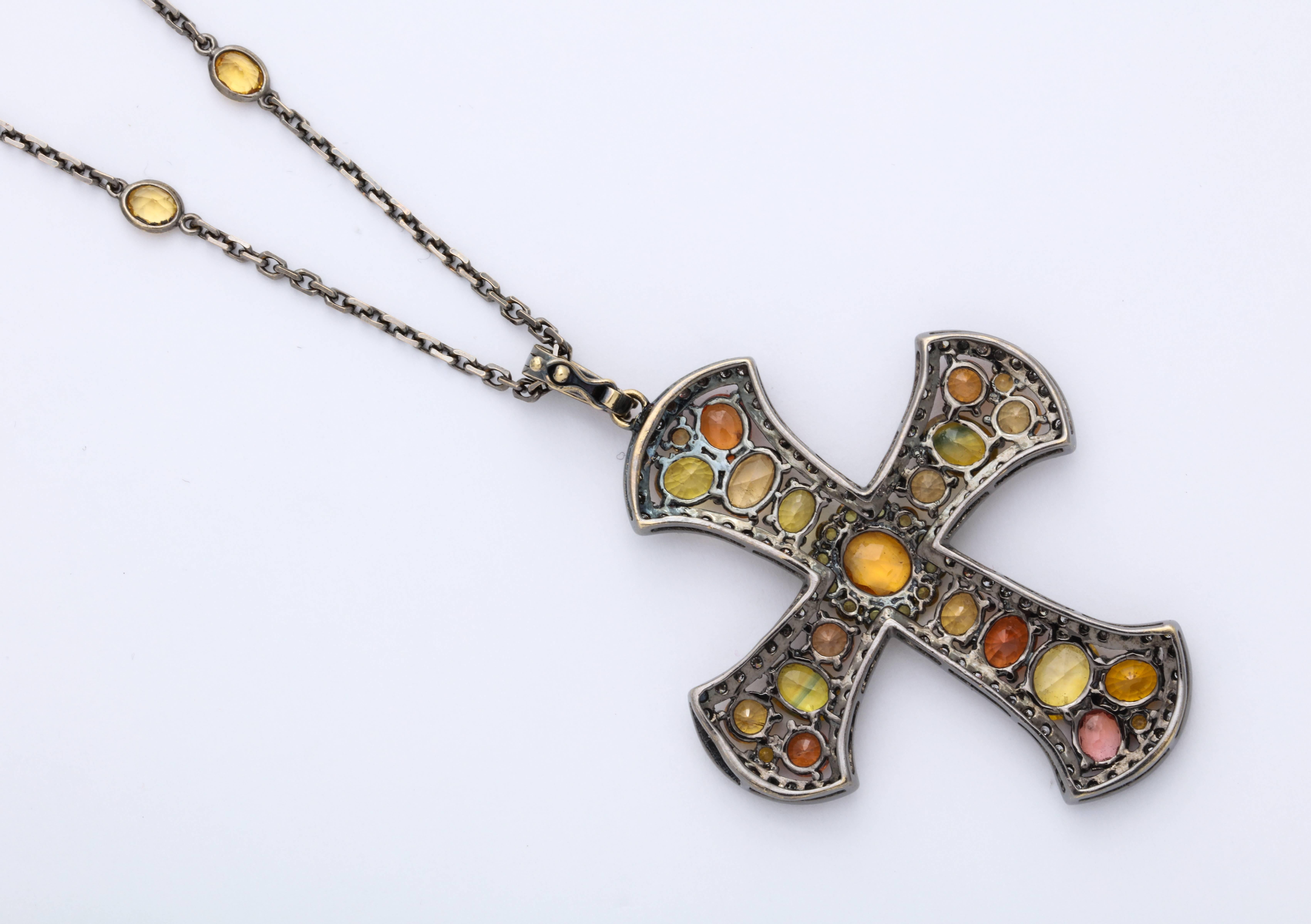 Oval Cut White Gold and Multi-Color Orange Sapphire Stylized Gothic Cross Pendant For Sale