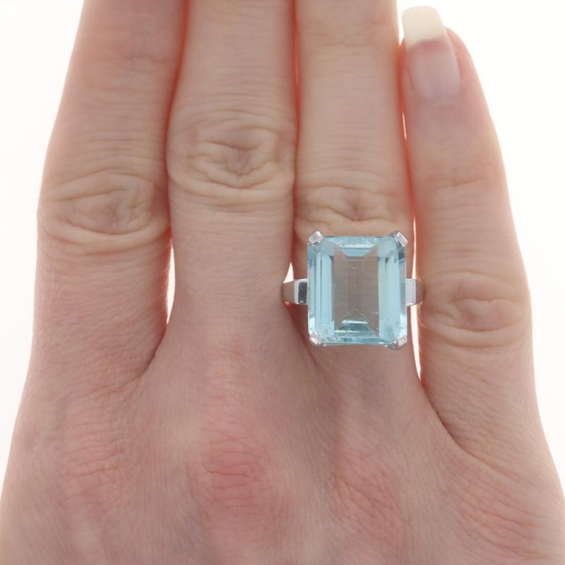 Size: 6 3/4
Sizing Fee: Up 2 sizes for $35 or Down 1 1/2 sizes for $25

Metal Content: 14k White Gold

Stone Information

Natural Aquamarine
Treatment: Heating
Carat(s): 9.65ct
Cut: Emerald
Color: Blue

Total Carats: 9.65ct

Style: Cocktail