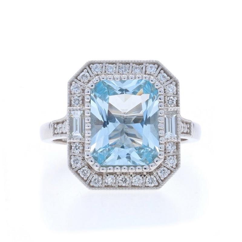 Size: Please contact us for sizing information.

Metal Content: 14k White Gold

Stone Information

Natural Aquamarine
Treatment: Heating
Carat(s): 2.60ct
Cut: Radiant
Color: Blue

Natural Diamonds
Carat(s): .16ctw
Cut: Baguette
Color: F - G
Clarity: