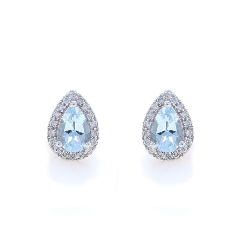 Metal Content: 14k White Gold

Stone Information

Natural Aquamarines
Treatment: Heating
Carat(s): .70ctw
Cut: Pear
Color: Blue

Natural Diamonds
Carat(s): .12ctw
Cut: Round Brilliant
Color: G - H
Clarity: VS2 - SI1

Total Carats: .82ctw

Style: