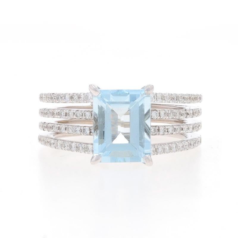 Size: 6 1/4
Sizing Fee: Up 1 1/2 sizes for $50 or Down 1 size for $50

Metal Content: 18k White Gold

Stone Information

Natural Aquamarine
Treatment: Heating
Carat(s): 2.09ct
Cut: Emerald
Color: Blue

Natural Diamonds
Carat(s): .57ctw
Cut: Round