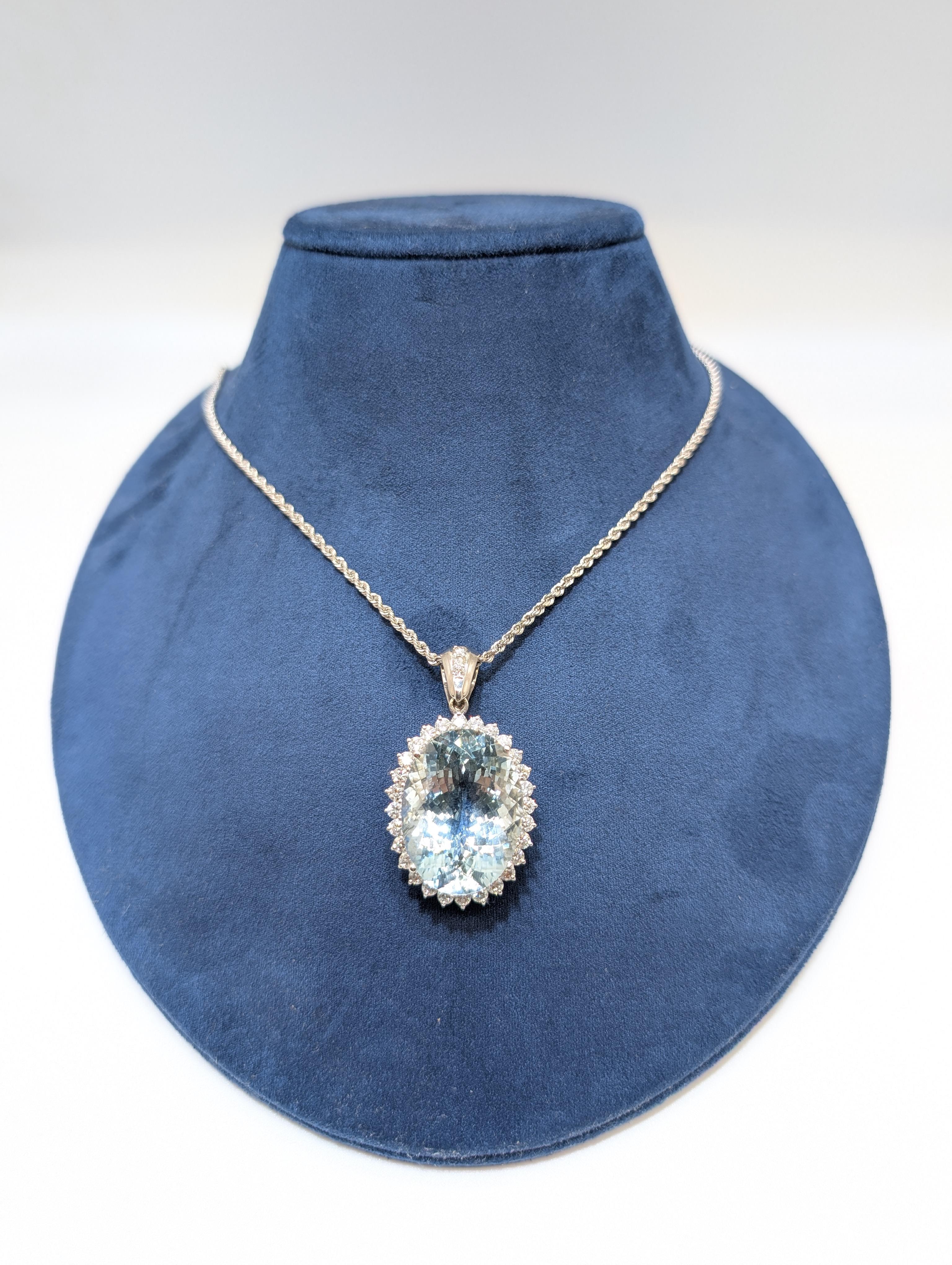 14K White Gold Rope Chain Necklace with 36.81 Carat Aquamarine and Diamond Halo Pendant

Make a striking statement with this breathtaking 14 karat white gold necklace, featuring an 18-inch rope chain and an extraordinary pendant. Suspended from the