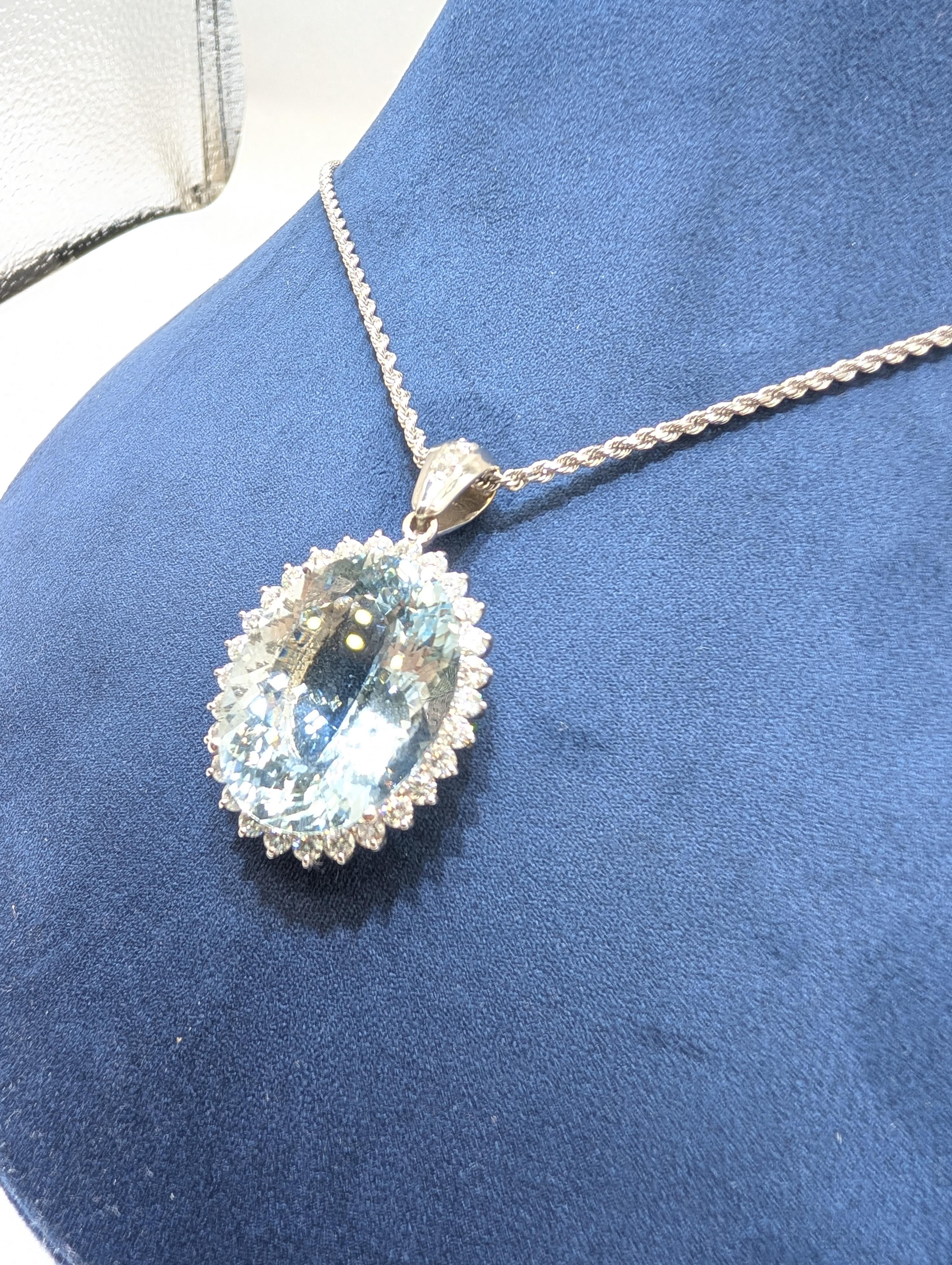 White Gold Aquamarine Pendant Set In Halo Setting In New Condition For Sale In New York, US