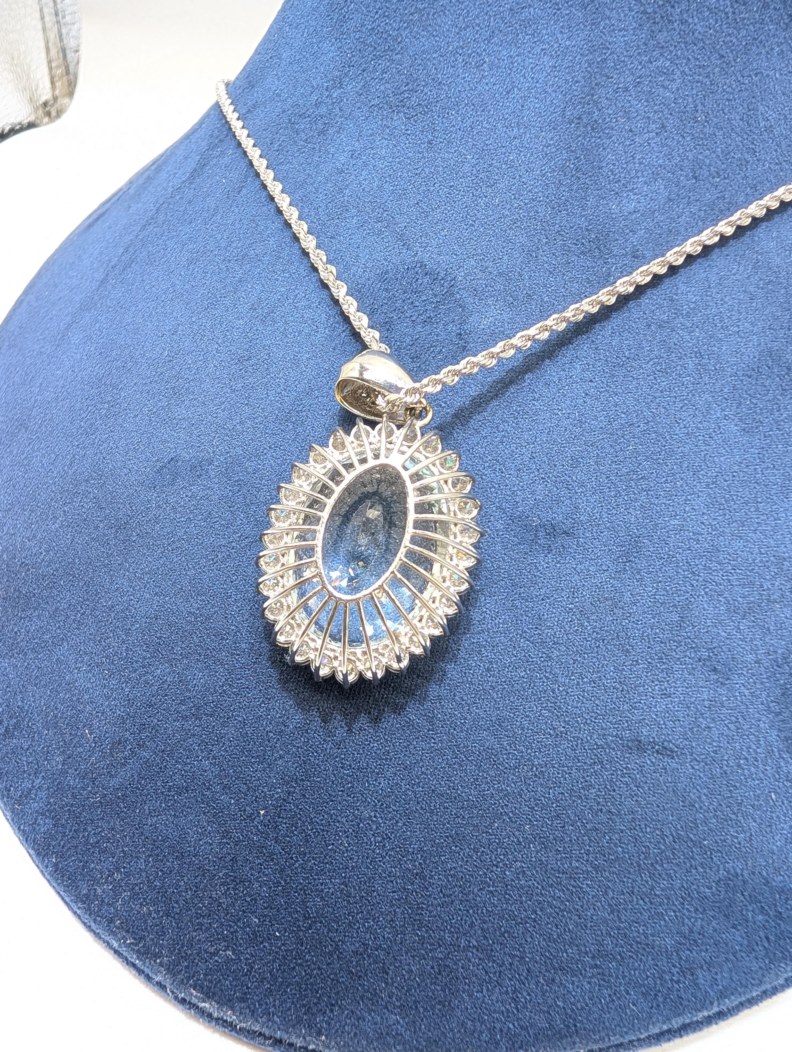 Women's White Gold Aquamarine Pendant Set In Halo Setting For Sale