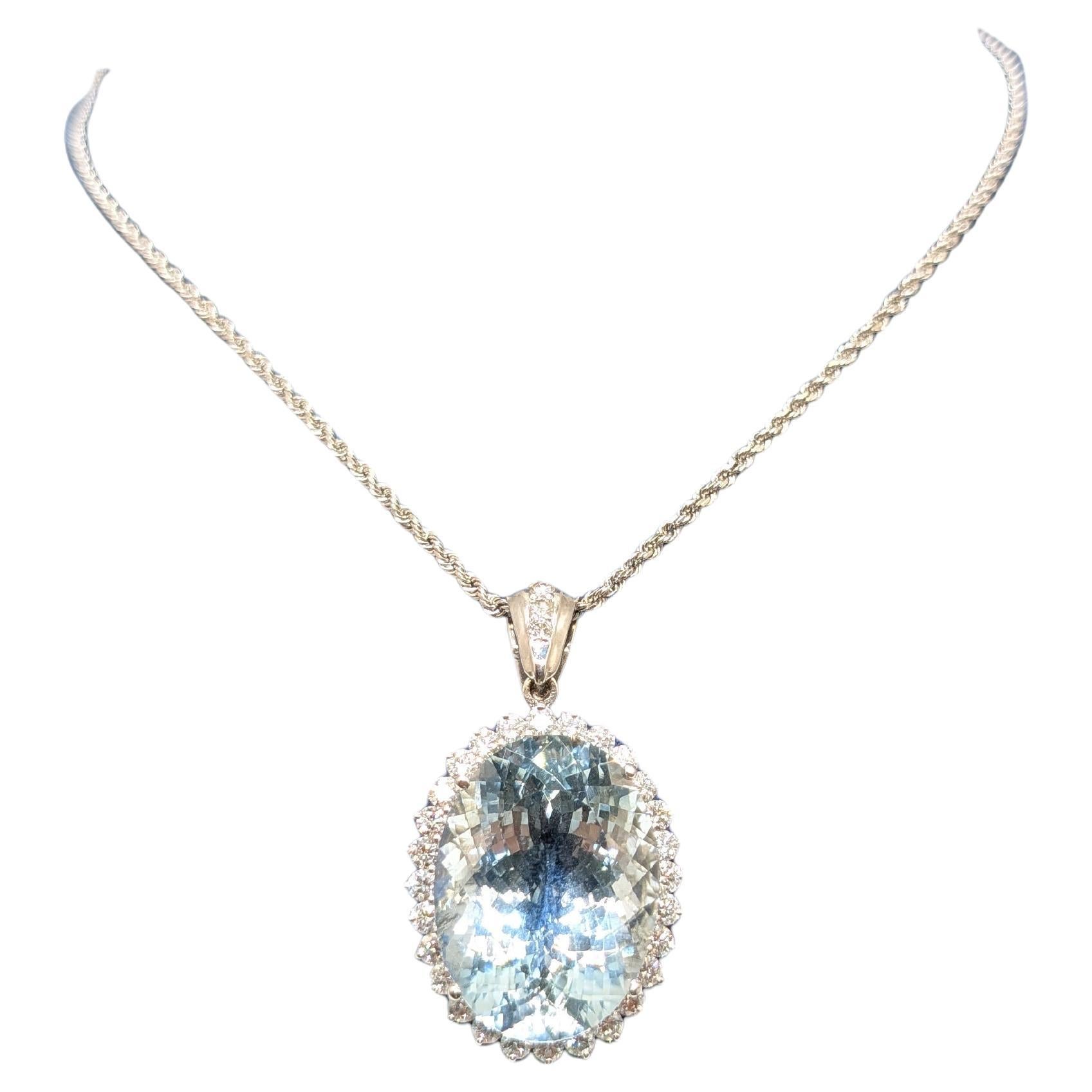 White Gold Aquamarine Pendant Set In Halo Setting For Sale