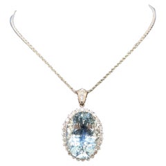 White Gold Aquamarine Pendant Set In Halo Setting