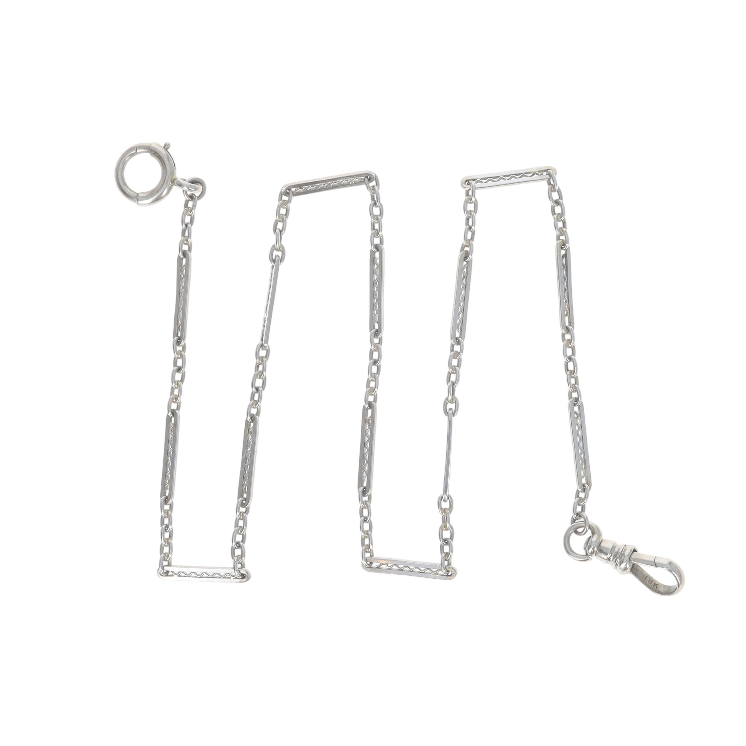 Design/One:  Uhrenkette
Epoche: Art Deco

Metall Inhalt: 18k Weißgold

Kette Stil: Fancy Lang & Kurz
Verschlusstyp: Federring-Verschluss & Karabiner-Verschluss
Merkmale: Geätzte Detaillierung

Messungen

Kettenbreite: 3/32