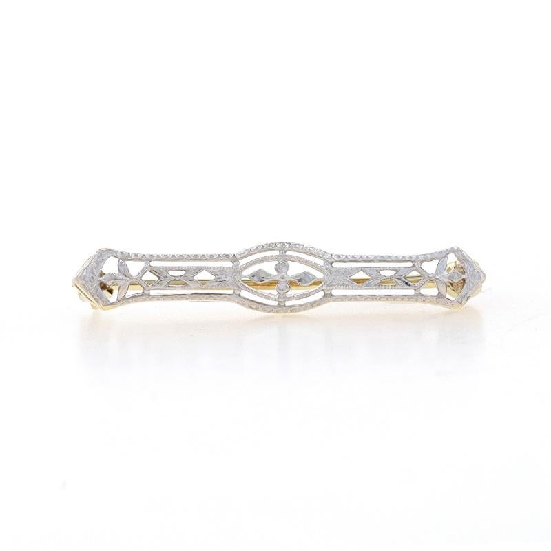Era: Art Deco
Date: 1920s - 1930s

Metal Content: 14k Yellow Gold & 14k White Gold

Style: Lingerie Bar Pin
Fastening Type: Hinged Pin and Locking C-Clasp
Features: Filigree & Milgrain Detailing

Measurements
Tall: 3/16