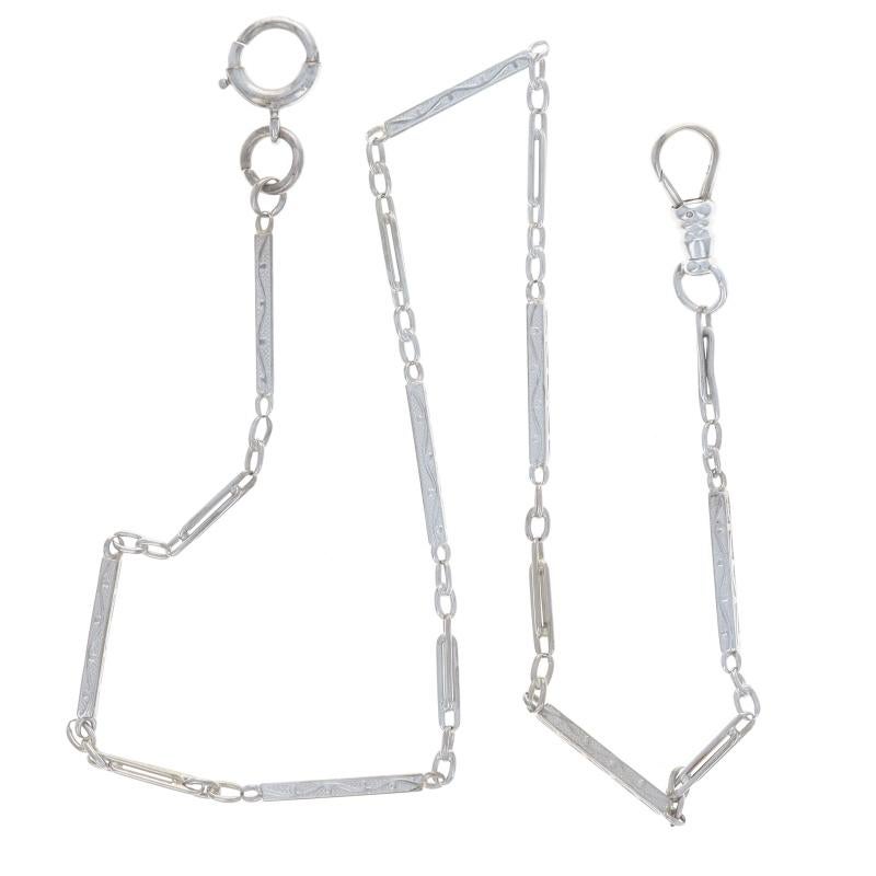 Época: Art Déco

Contenido de metal: Oro blanco de 14 quilates

Estilo: Cadena de reloj de bolsillo
Estilo de cadena: Fancy Larga y Corta
Tipo de cierre: Cierre de anilla y mosquetón

Medidas

Ancho de la cadena: 3/32
