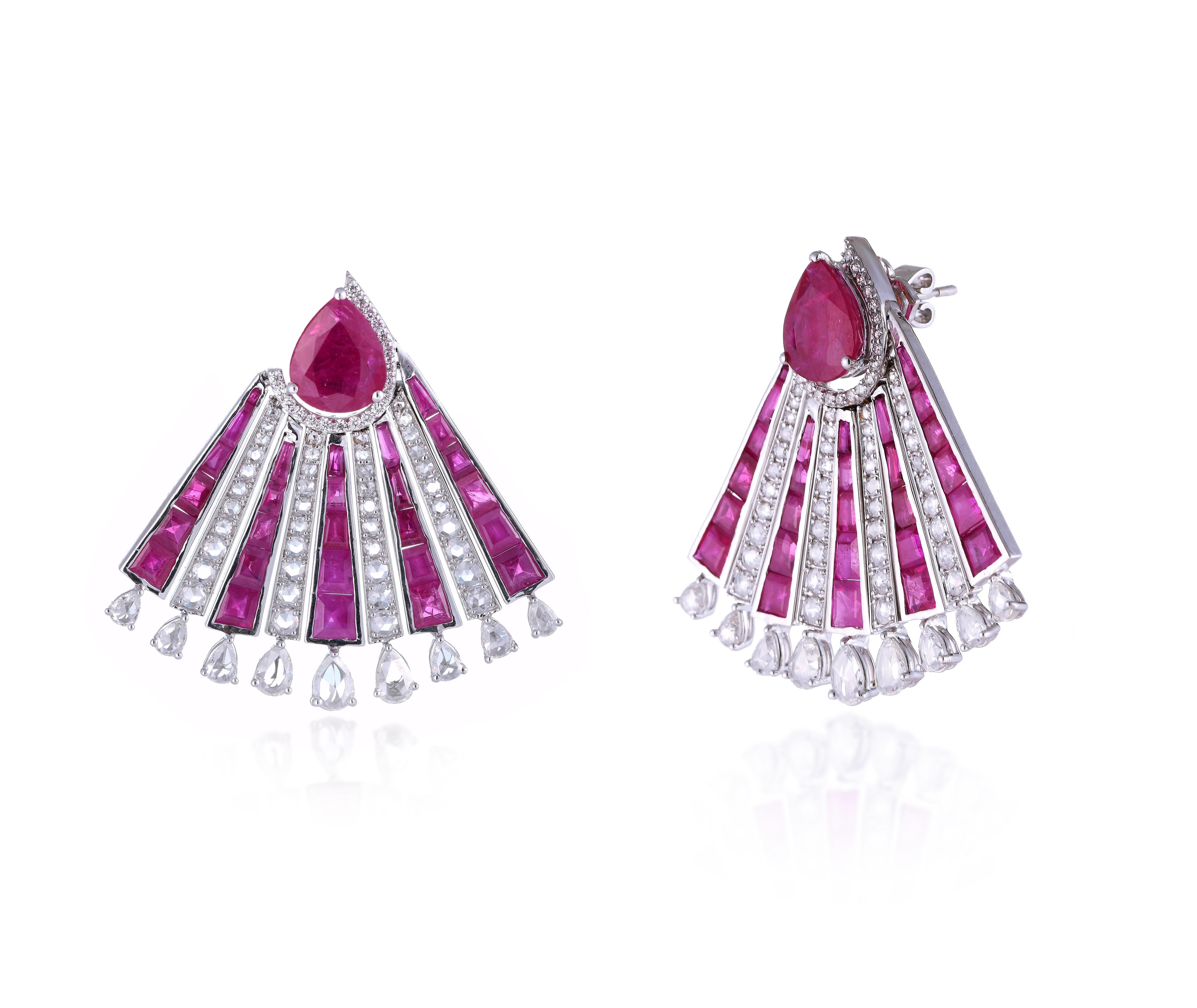 White gold Art Deco studs with a stylish fan silhouette set with approx. 20 carats of rubies and  4.52 carats of full cut and rose cut diamonds.