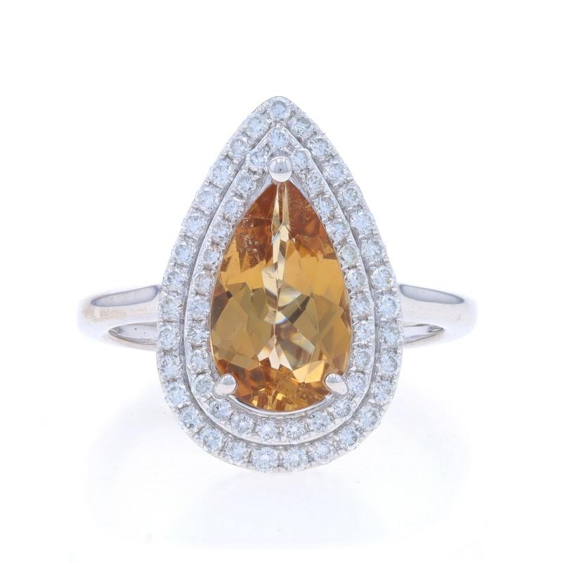 Size: 7
Sizing Fee: Up 1 1/2 sizes for $40 or Down 1 size for $40

Metal Content: 14k White Gold

Stone Information

Natural Axinite
Carat(s): 1.86ct
Cut: Pear
Color: Orangey Brown

Natural Diamonds
Carat(s): .55ctw
Cut: Round Brilliant
Color: F -