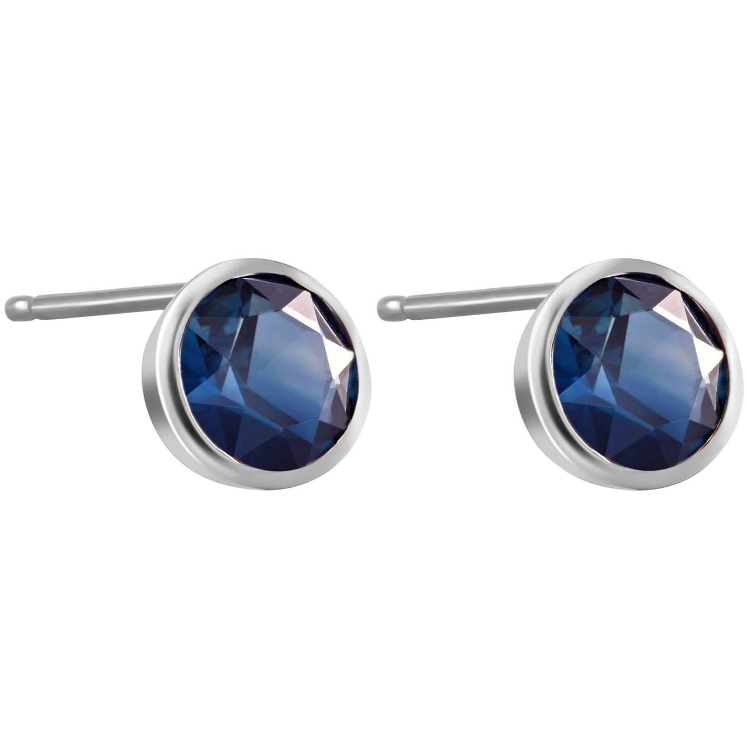 White Gold Bezel Set Stud Earrings with Pair Sapphire Weighing 1.60 Carat 
