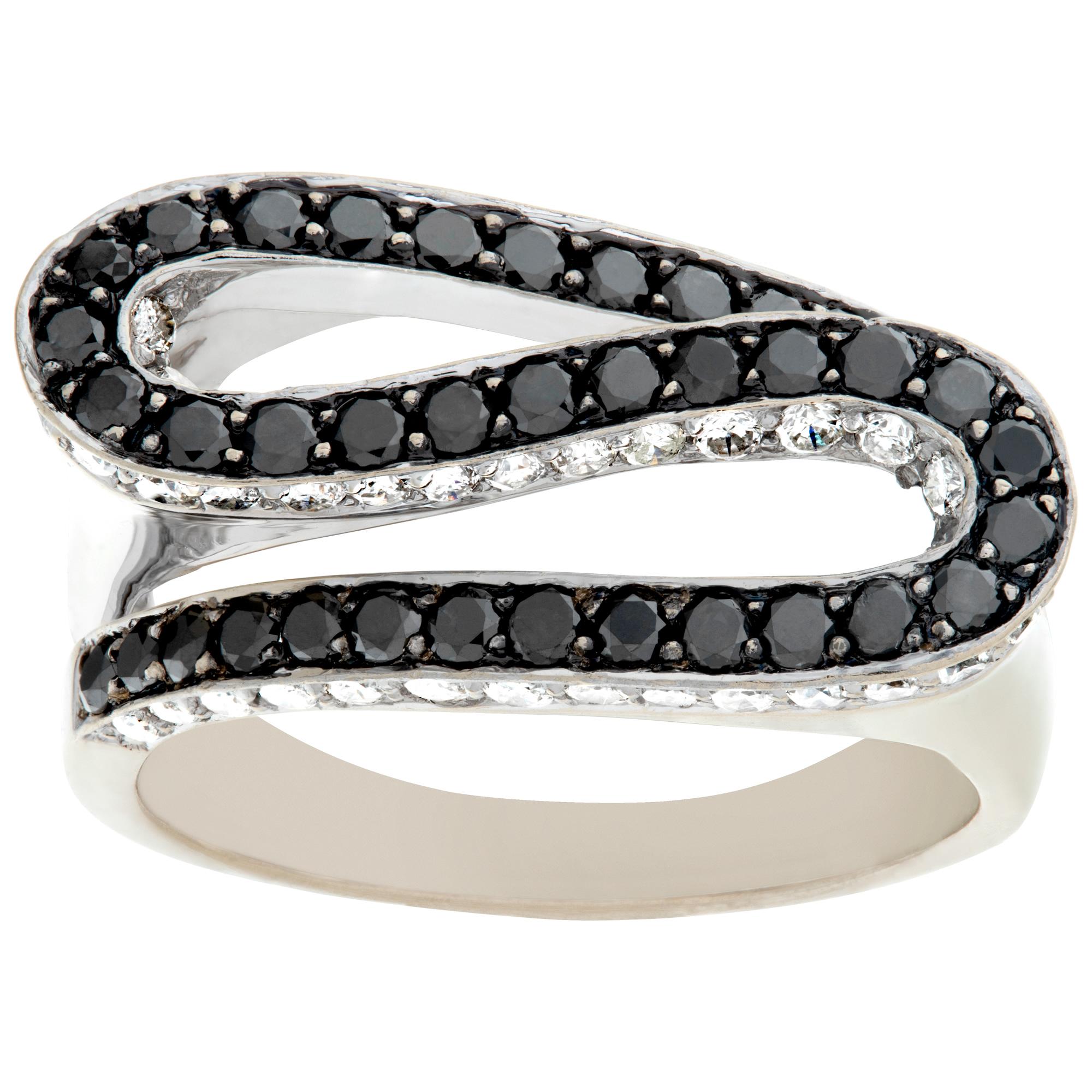 Black and white diamonds modern wavy design ring in 18k white gold. White full cut diamonds total approx. weight: 0.50 carat. White and eye clean. Size 8.This Diamond ring is currently size 8 and some items can be sized up or down, please ask! It