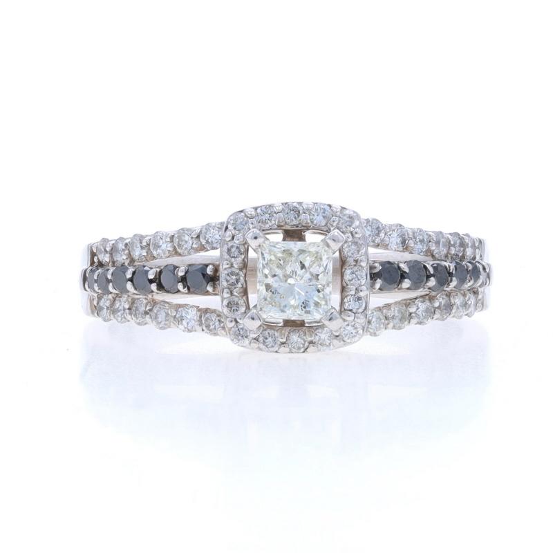 Size: 8 1/2
Sizing Fee: Up 2 sizes for $35 or Down 1 size for $25

Metal Content: 10k White Gold

Stone Information

Natural Diamond
Carat(s): .34ct
Cut: Princess
Color: L
Clarity: SI2
Stone Note: (center)

Natural Diamonds
Carat(s): .26ctw
Cut:
