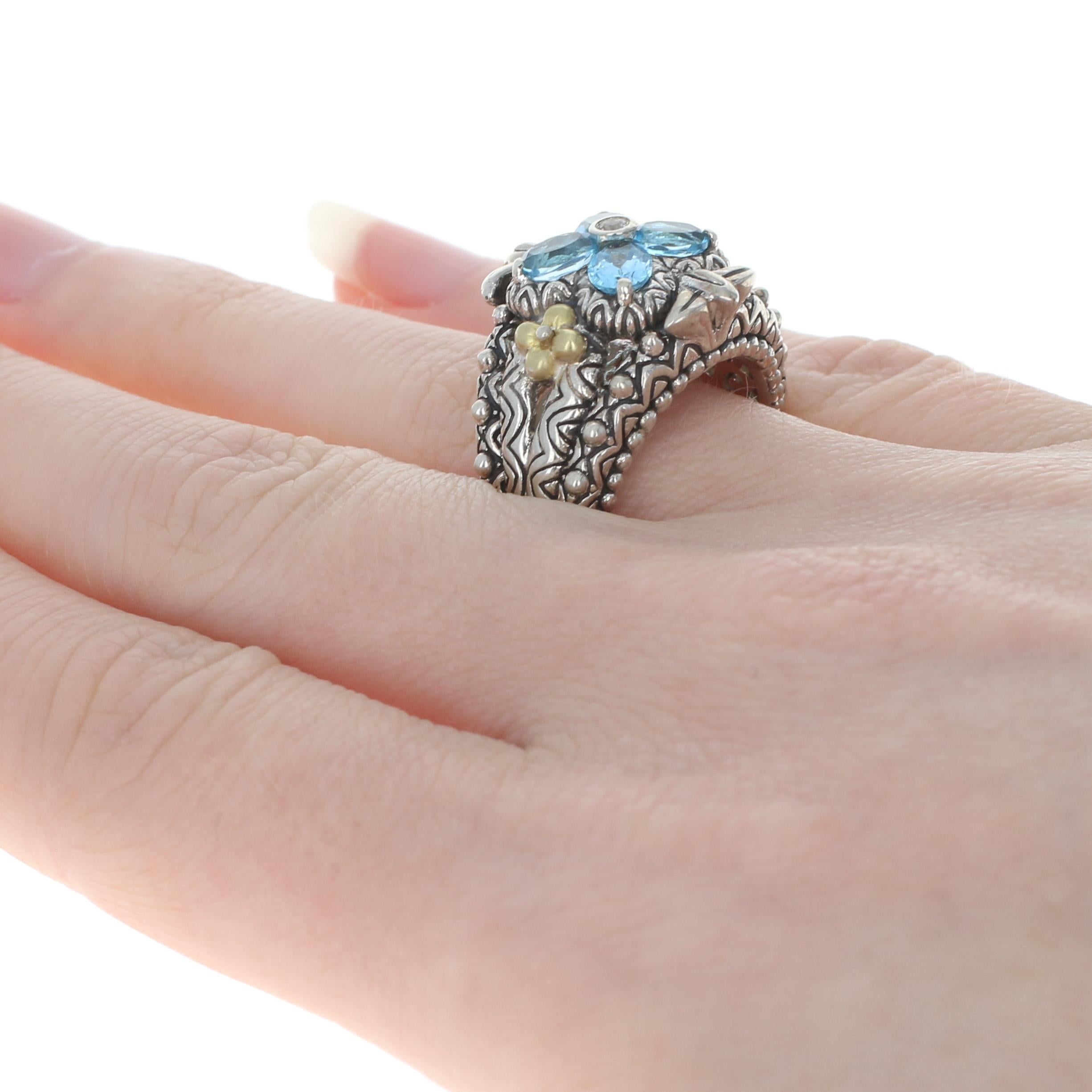 Este anillo es de la talla 7.

Marca: Barbara Bixby

Contenido de metal: Plata de ley garantizada y oro de 18 quilates como está estampado

Información sobre la piedra: 
Topacio auténtico 
Tratamiento: Mejorado rutinariamente (azul)
Colores: Azul y