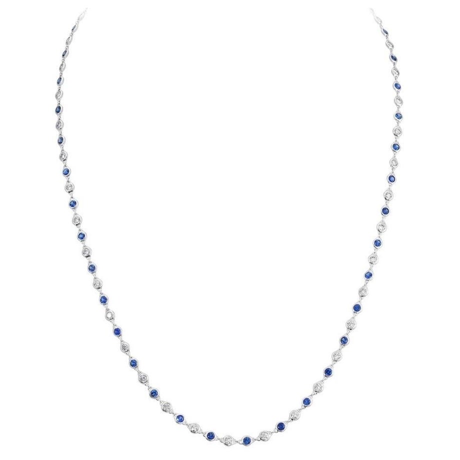 Collana a catena in oro bianco con zaffiri blu e diamanti in vendita