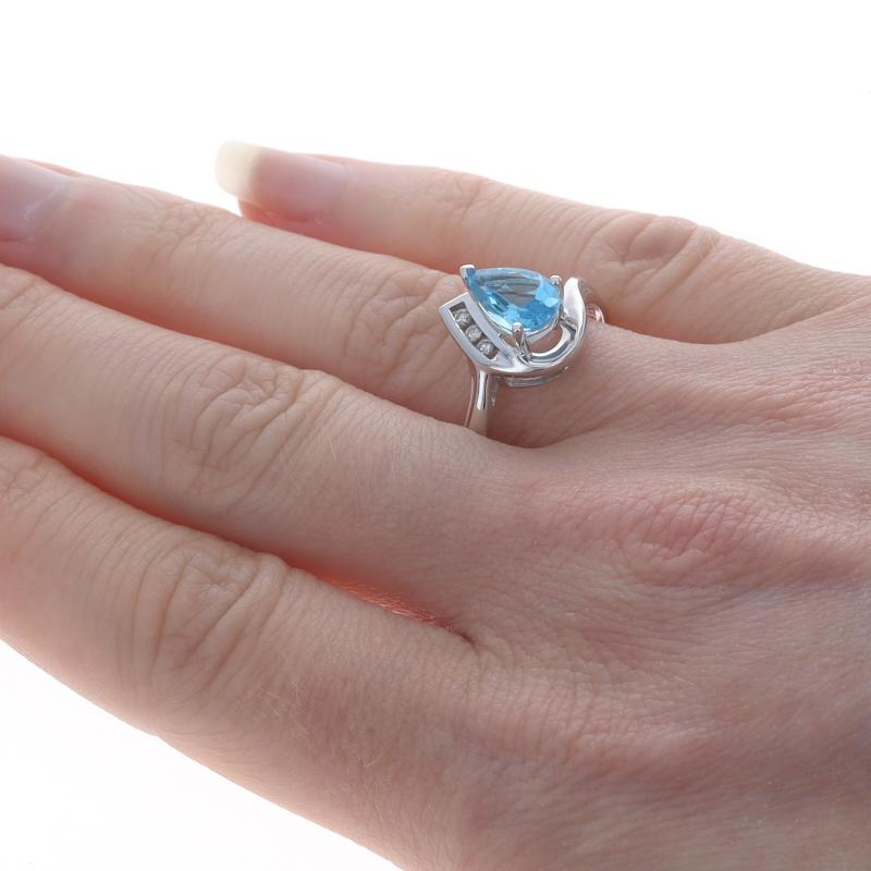 White Gold Blue Topaz & Diamond Bypass Ring - 10k Pear 2.06ctw In Excellent Condition For Sale In Greensboro, NC