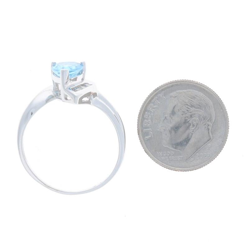 Women's White Gold Blue Topaz & Diamond Bypass Ring - 10k Pear 2.06ctw For Sale