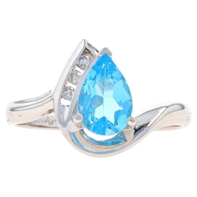 White Gold Blue Topaz & Diamond Bypass Ring - 10k Pear 2.06ctw