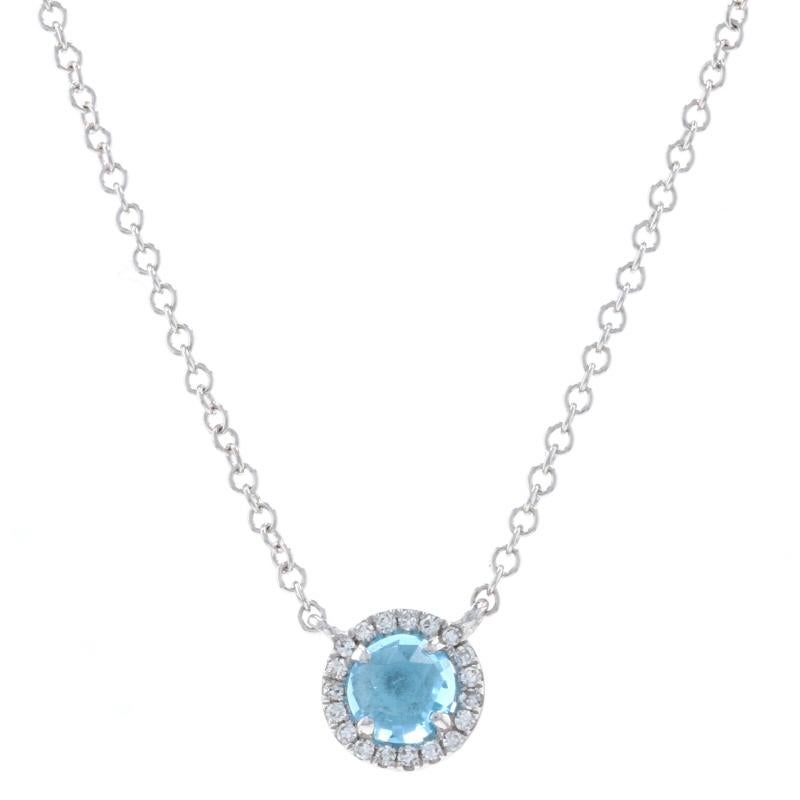 Metal Content: 14k White Gold  

Stone Information: 
Natural Topaz
Treatment: Routinely Enhanced 
Carat: 38ct
Cut: Rose Cut Cabochon
Color: Blue

Natural Diamonds
Carats: .08ctw
Cut: Single
Color: F - G   
Clarity: VS1 - VS2

Total Carats: