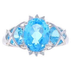 Bague à trois pierres en or blanc 10 carats avec topaze bleue et cœur ovale de 3,30 carats