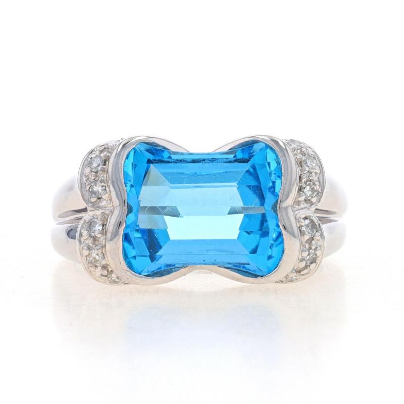 Size: 7 1/4
Sizing Fee: Up 1 1/2 sizes for $35 or Down 1/2 a size for $30

Metal Content: 14k White Gold

Stone Information

Natural Blue Topaz
Treatment: Routinely Enhanced
Carat(s): 7.90ct
Cut: Modified Barrel

Natural Diamonds
Carat(s):