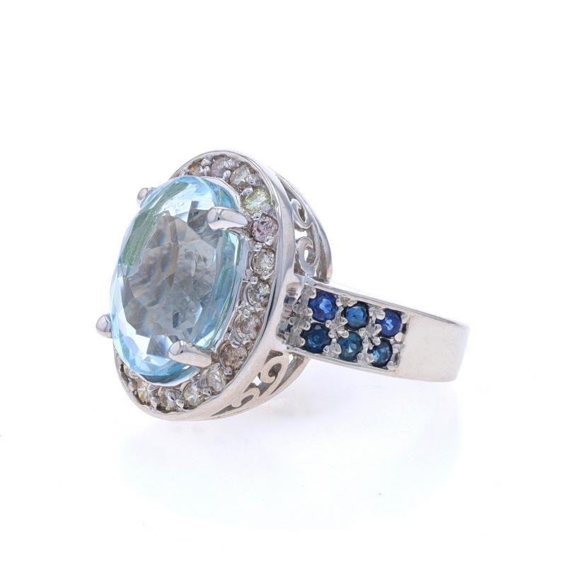 White Gold Blue Topaz, Diamond, & Sapphire Halo Ring - 14k Oval 7.52ctw In Excellent Condition For Sale In Greensboro, NC