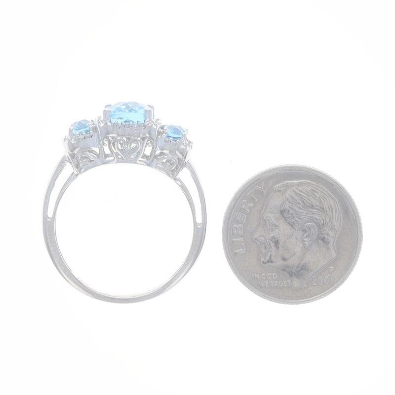 White Gold Blue Topaz & Diamond Three-Stone Halo Ring - 10k Rect Cushion 2.45ctw For Sale 1