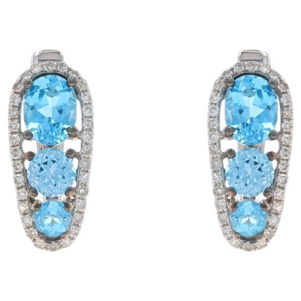 White Gold Blue Topaz & Diamond Three-Stone J-Hoop Earrings - 14k Oval 2.04ctw For Sale