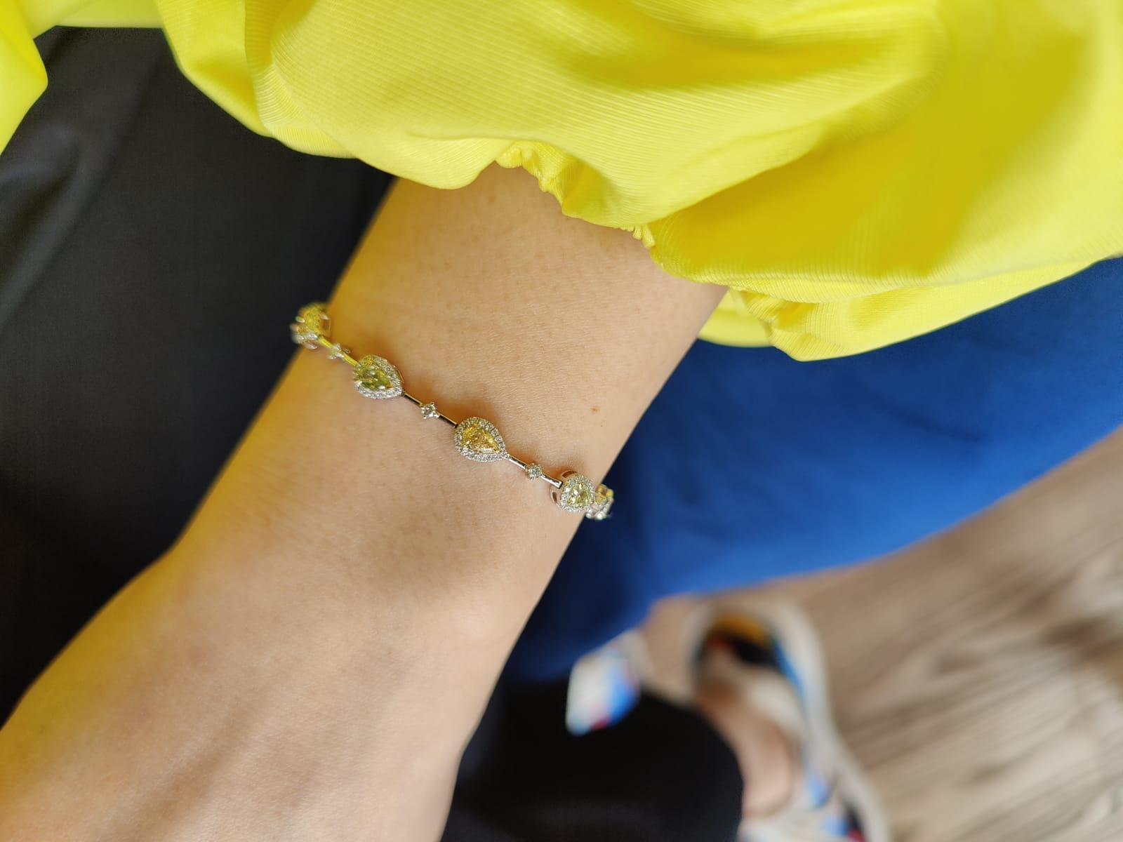 Women's White gold bracelet with 10 fancy coloured diamonds For Sale