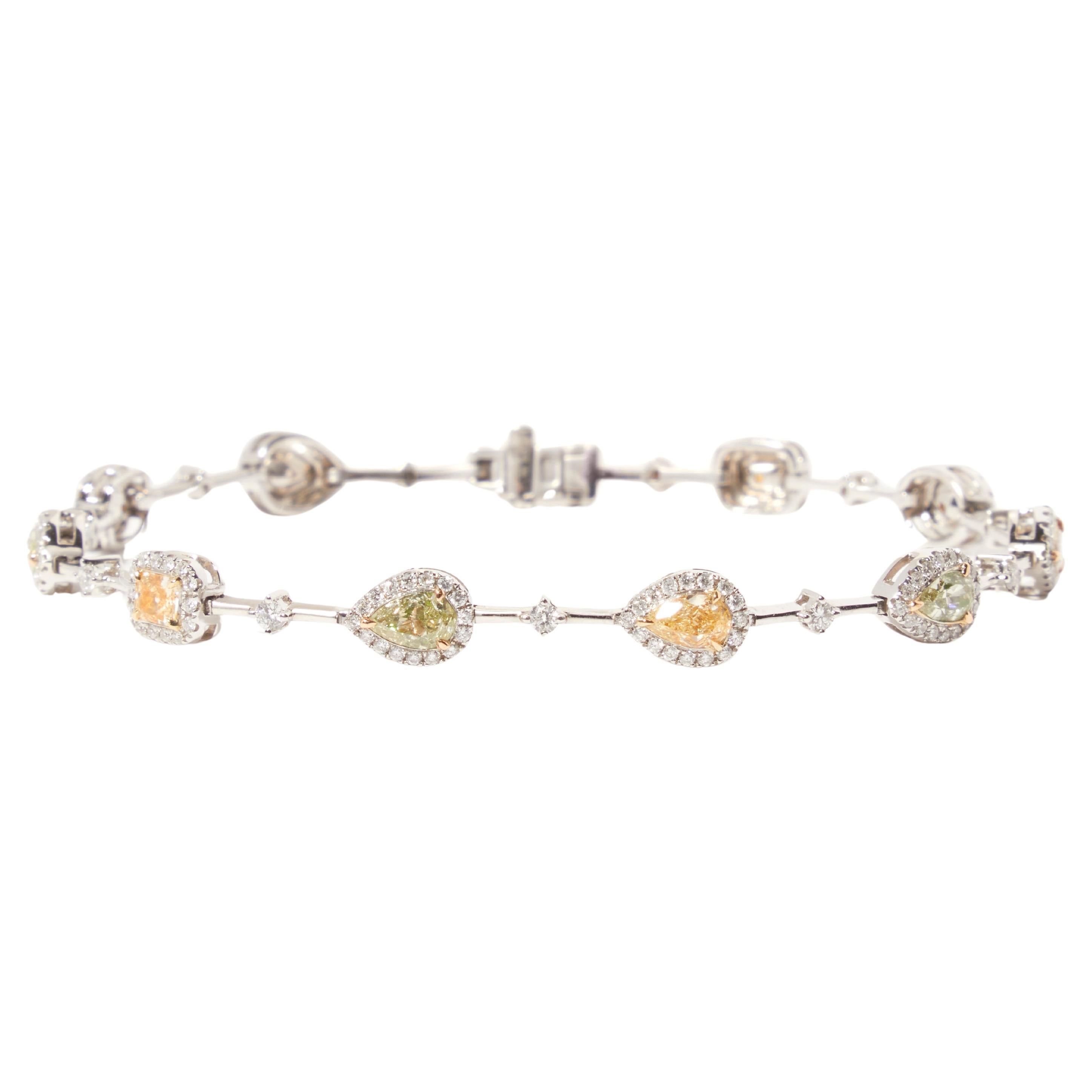 White gold bracelet with 10 fancy coloured diamonds For Sale