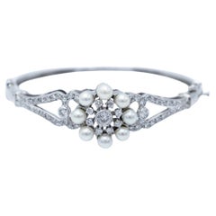 White gold bracelet with diamonds and pearls