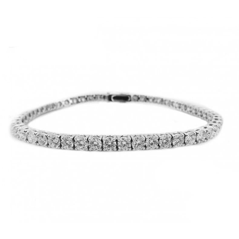 WHITE GOLD BRILLIANT CUT TENNIS BRACELET - REF 6.67 CT


Set in 18K White gold


Total diamond weight: 6.67 ct
Color: G
Clarity: VS

Total bracelet weight: 11.02 grams
