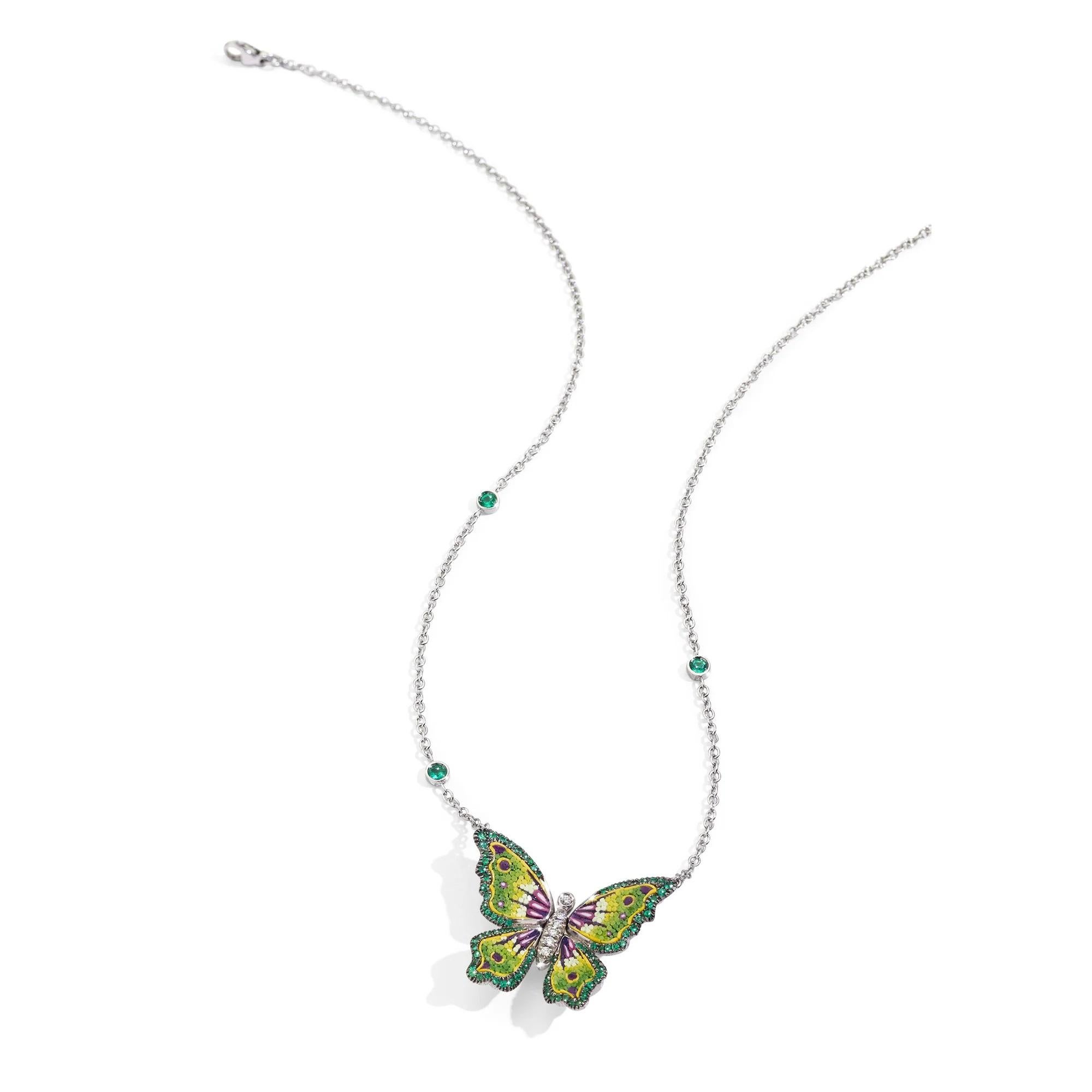 Admire the mesmerizing beauty of the Malachite butterfly-inspired necklace, a testament to the wonders of nature. 
Handcrafted with luminous white gold, adorned with dazzling diamonds, vibrant emeralds, and intricate micromosaic, it captures the