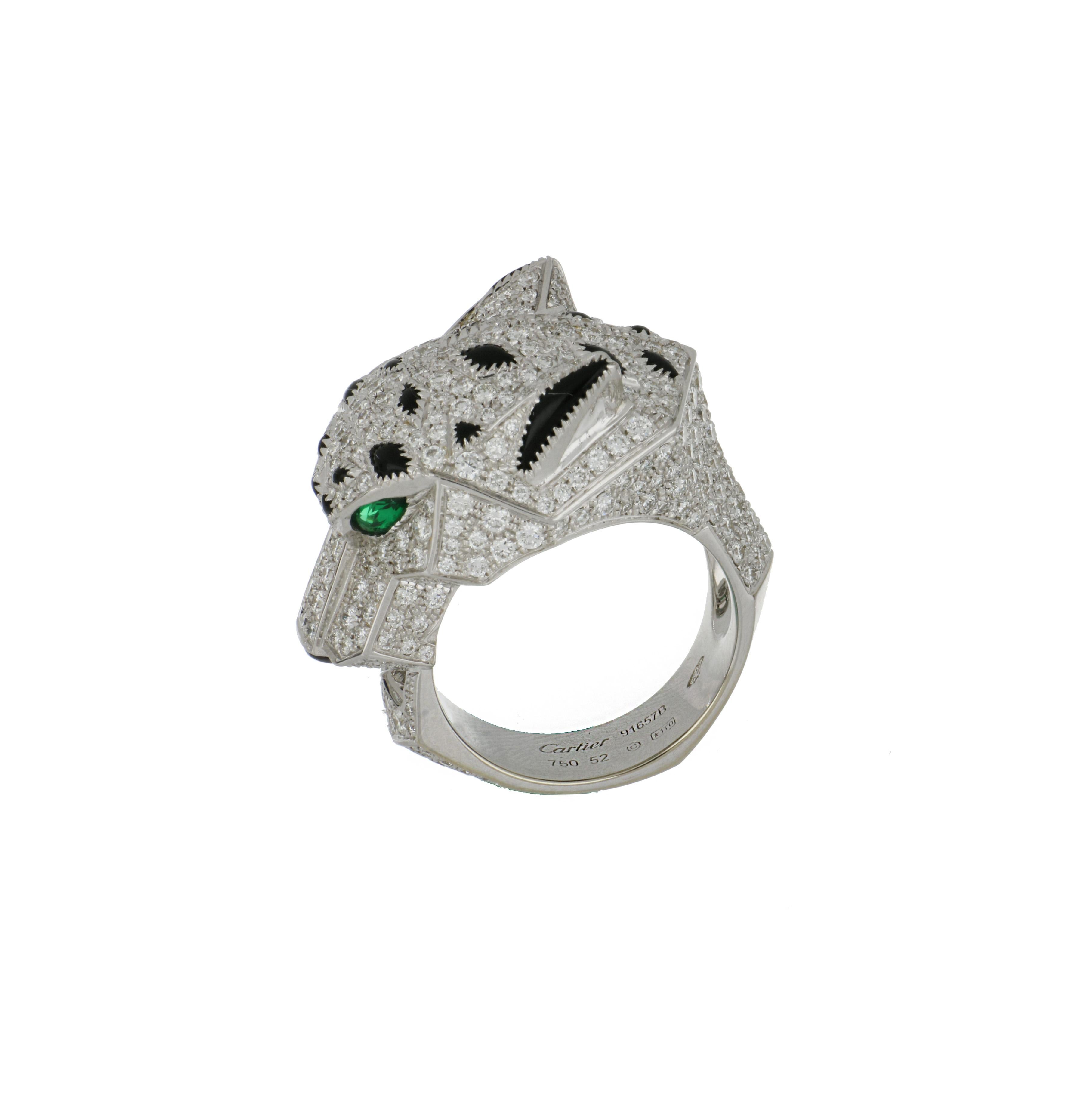 18K white gold Panthère de Cartier ring.  Set with onyx, emeralds and 365 round brilliant cut diamonds that total 2.55 carats.  Serial number 91657B and comes with box and papers.  Ring is a size 6.  Presentation area measures 1 inch by 5/8 of an