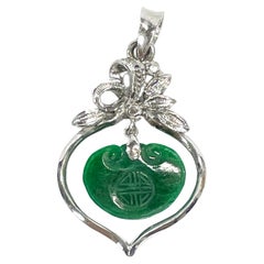 Retro White Gold Carved Jade Chinese Pendant