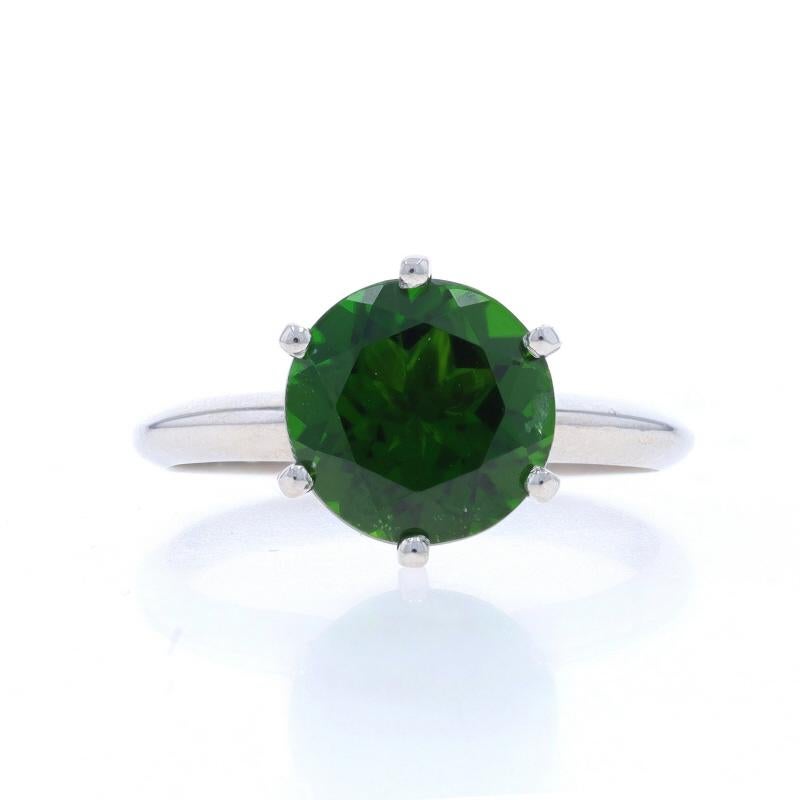 Size: 6
Sizing Fee: Up 3 sizes for $40 or Down 2 sizes for $30

Metal Content: 18k White Gold

Stone Information

Natural Chrome Diopside
Carat(s): 2.53ct
Cut: Round
Color: Green

Total Carats: 2.53ct

Style: Cocktail Solitaire

Measurements

Face