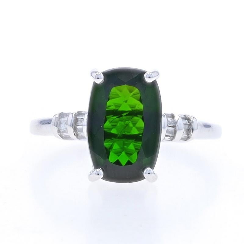 Size: 7 1/4
Sizing Fee: Up 2 sizes for $40 or Down 1 size for $30

Metal Content: 10k White Gold

Stone Information

Natural Chrome Diopside
Carat(s): 3.02ct
Cut: Rectangular Cushion
Color: Green

Natural Diamonds
Carat(s): .10ctw
Cut: