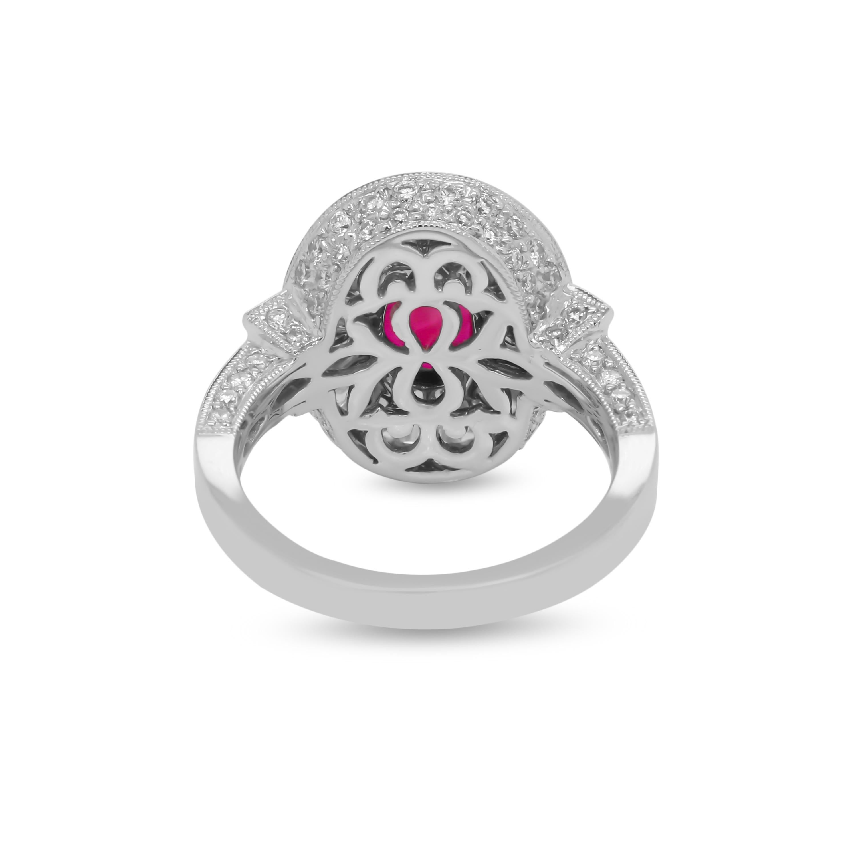 Contemporary White Gold Cocktail Ring with Baguette and Round Diamonds and Ruby Center For Sale