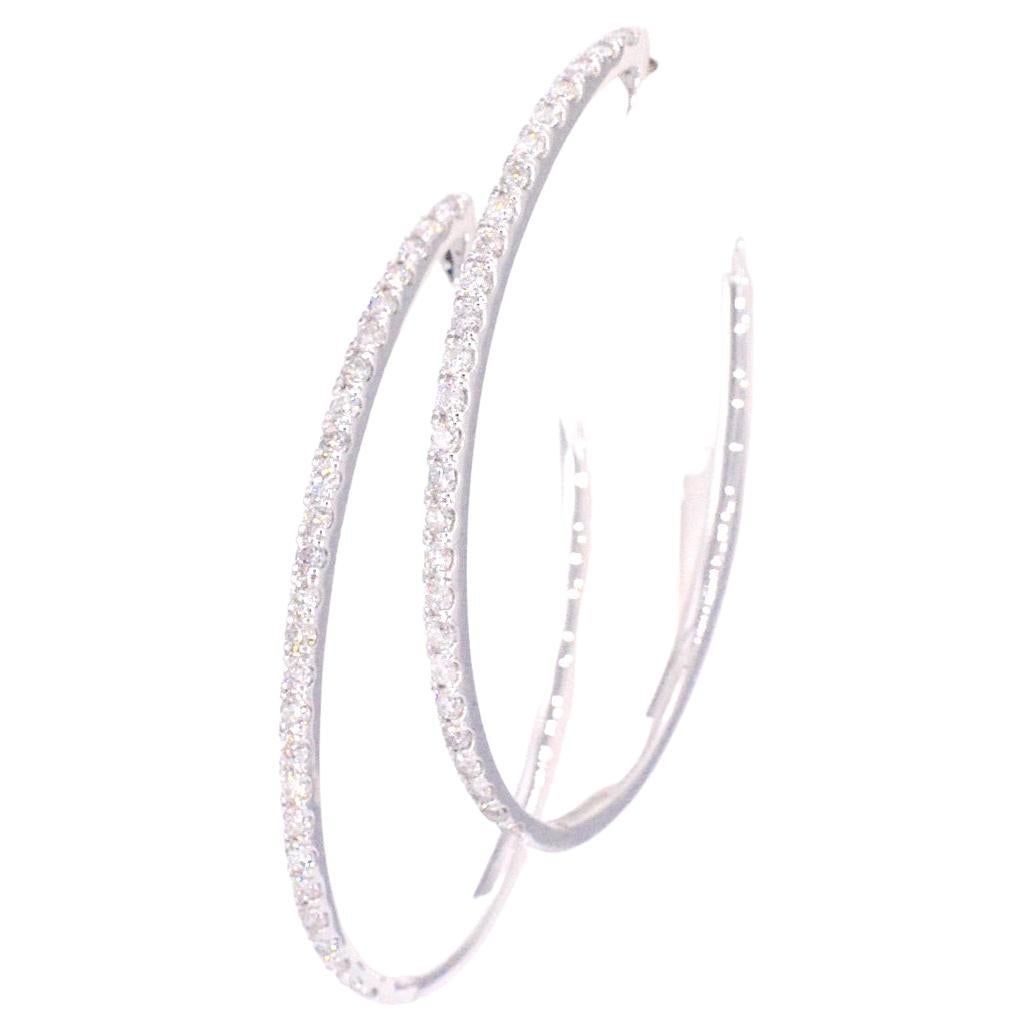Boucles d'oreilles Créole en or blanc avec diamants