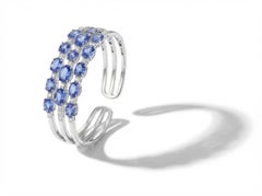 White Gold Cuff Bracelet with 12.64 Carats Tanzanite and 1.79 Carats Diamonds