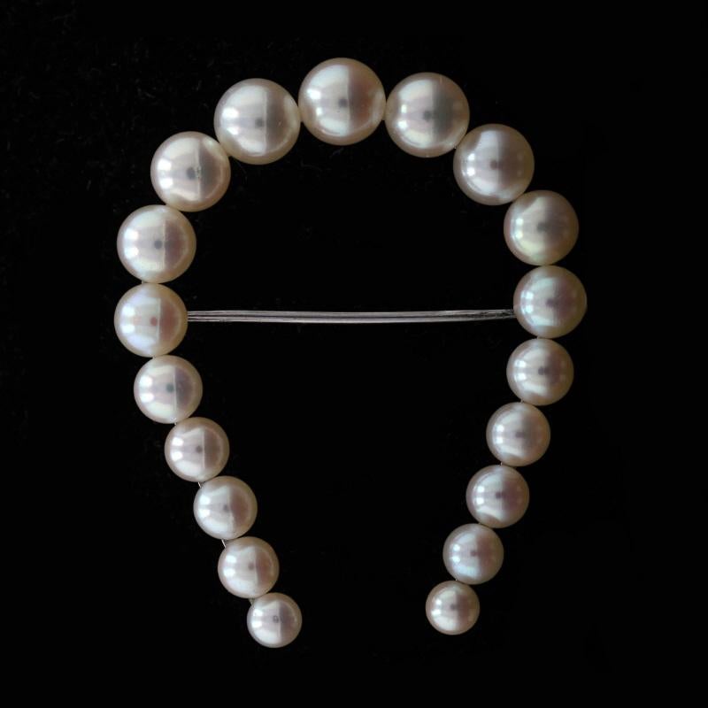 Era: Vintage

Metal Content: 14k White Gold

Stone Information

Cultured Akoya Pearls
Size: 4.3mm - 6.9mm

Style: Brooch 
Fastening Type: Hinged Pin and Whale Tail Clasp
Theme: Horseshoe, Good Luck

Measurements

Tall: 1 13/16