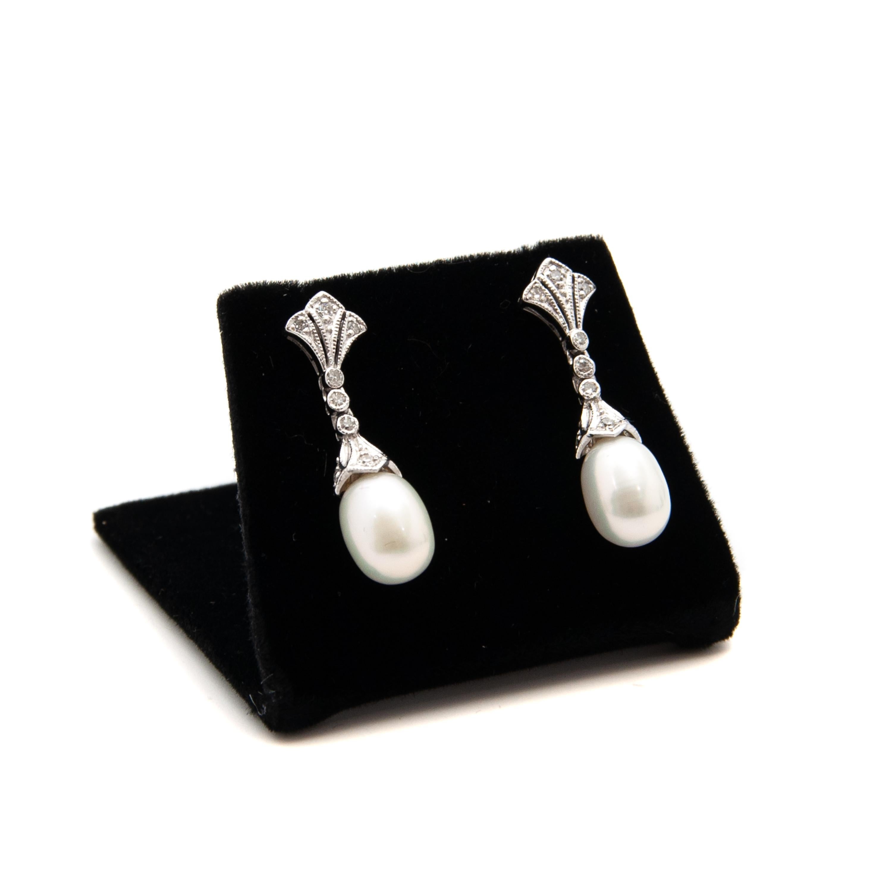 pearl diamond drop earrings white gold