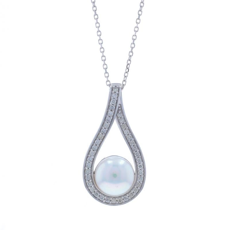 Metal Content: 14k White Gold

Stone Information

Natural Cultured Pearl

Natural Diamonds
Carat(s): .20ctw
Cut: Round Brilliant
Color: G - H
Clarity: VS2 - SI1

Total Carats: .20ctw

Chain Style: Cable
Necklace Style: Chain
Fastening Type: Lobster