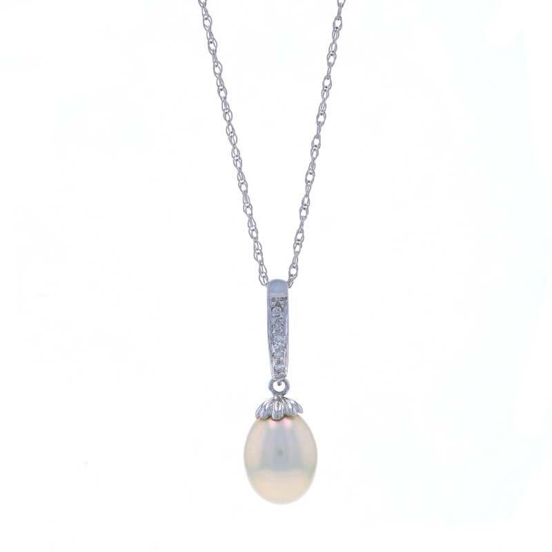 Metal Content: 14k White Gold

Stone Information

Cultured Pearl
Color: White

Natural Diamonds
Carat(s): .02ctw
Cut: Single
Color: I - J
Clarity: SI1 - SI2

Style: Solitaire with Accent
Chain Style: Prince of Wales
Necklace Style: Chain
Fastening
