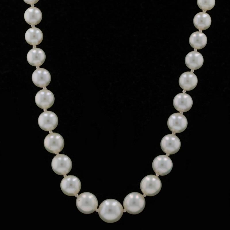 Era: Vintage

Metal Content: 14k White Gold

Stone Information
Cultured Pearls
Size Range: 5mm - 8mm

Natural Diamond
Carat: .06ct
Cut: European
Color: G
Clarity: SI2

Necklace Style: Graduated Knotted Strand
Fastening Type: Fishhook Clasp
Features: