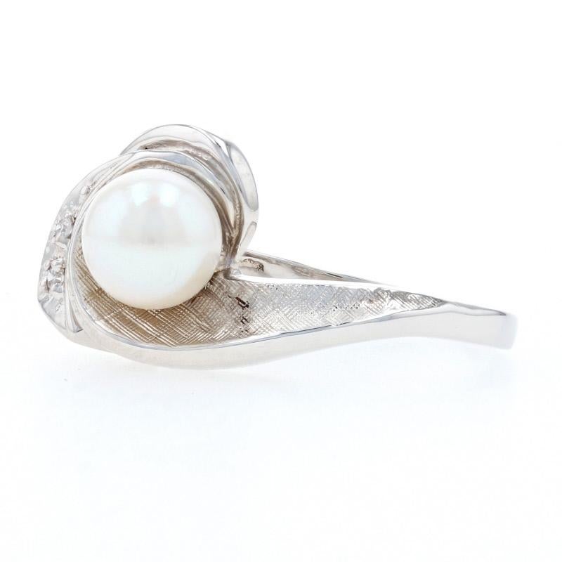 Size: 4 3/4
 Sizing Fee: Can be sized down 1 size or up 2 sizes for $25
 
 Metal Content: 14k White Gold
 
 Stone Information: 
 Genuine Cultured Pearl
 Diameter: 6.2mm 
 
 Natural Diamonds
 Total Carats: .02ctw
 Cut: Single 
 Color: G - H
 Clarity: