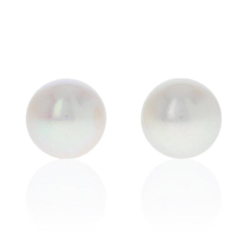 Metal Content: Guaranteed 14k Gold as stamped

Stone Information: 
Cultured Pearls

Natural Diamond
Clarity: SI2
Color: G
Cut: Round Brilliant
Carat: 0.03ct

Earrings
Style: Stud
Fastening Type: Butterfly Backs
Measurements: 11/32